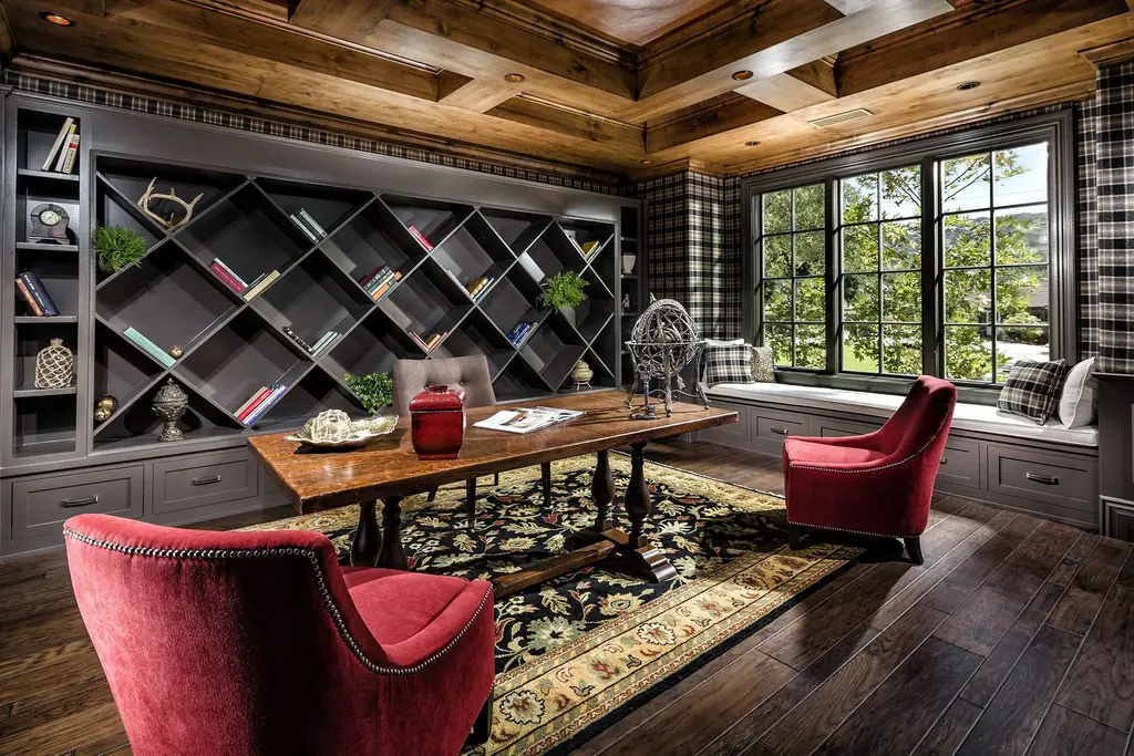 Library in a Chateau house, with a coffered timber ceiling and diamond-lattice shelving